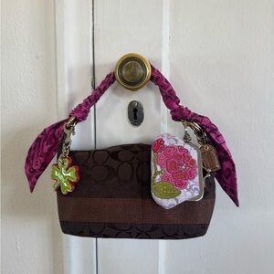 almost vintage 2008 Coach purse with Legacy stripe silk interior